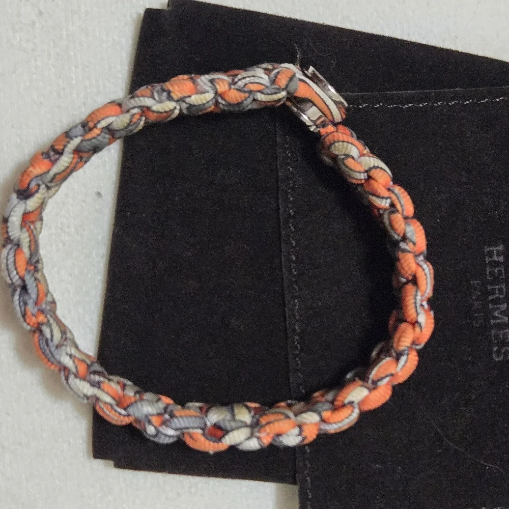 Authentic HERMES Silk Twill Kid Bracelet in Orange.